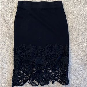Black pencil skirt with lace.